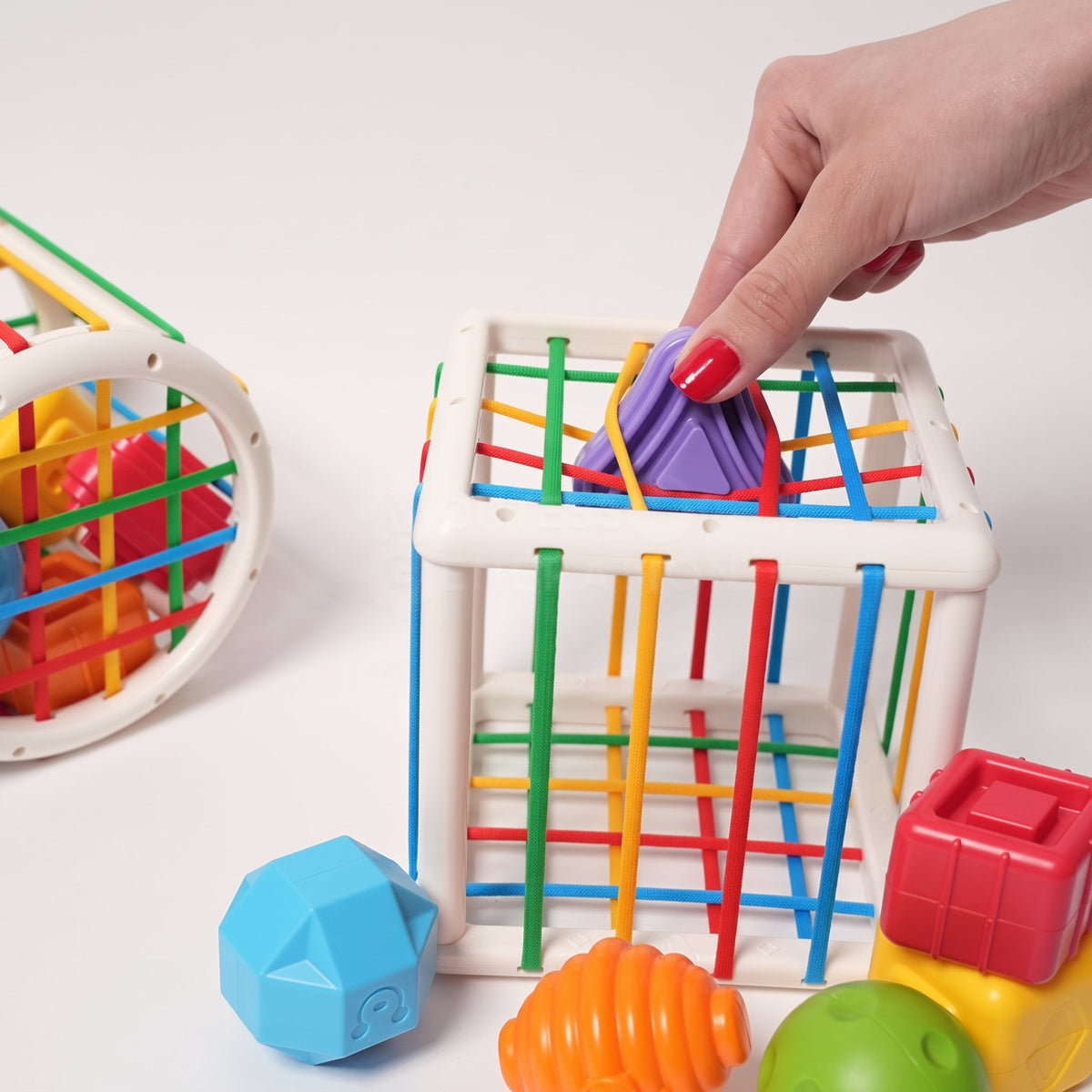 Shape Sorting Toy with 6 Textured Blocks and Elastic Strings