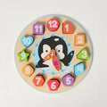 Wooden Clock Puzzle with Penguin and Shapes