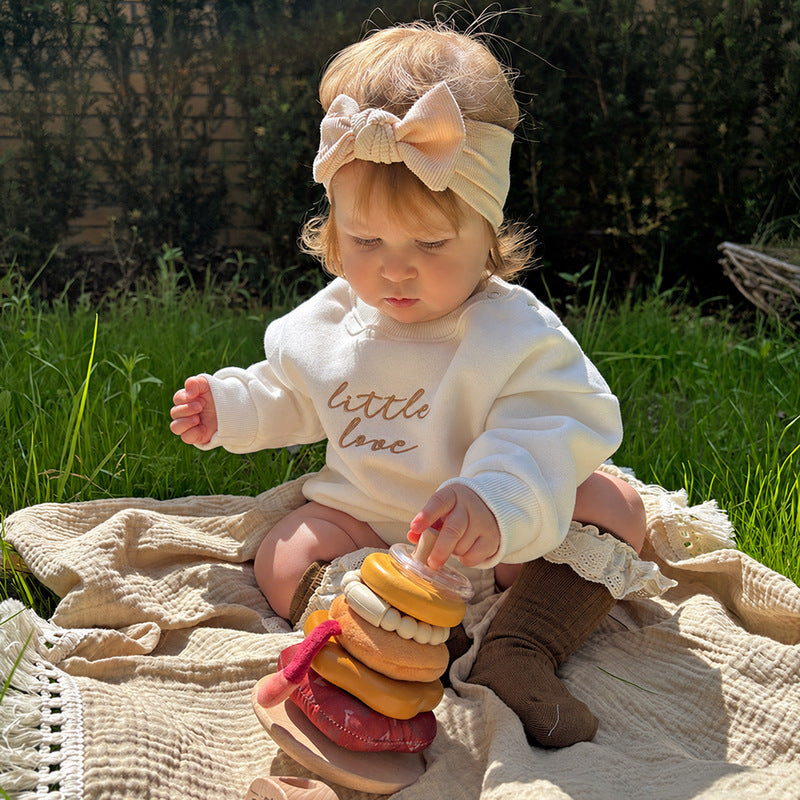 Wooden Stacking Toy with Lion, Multi-Texture Rings